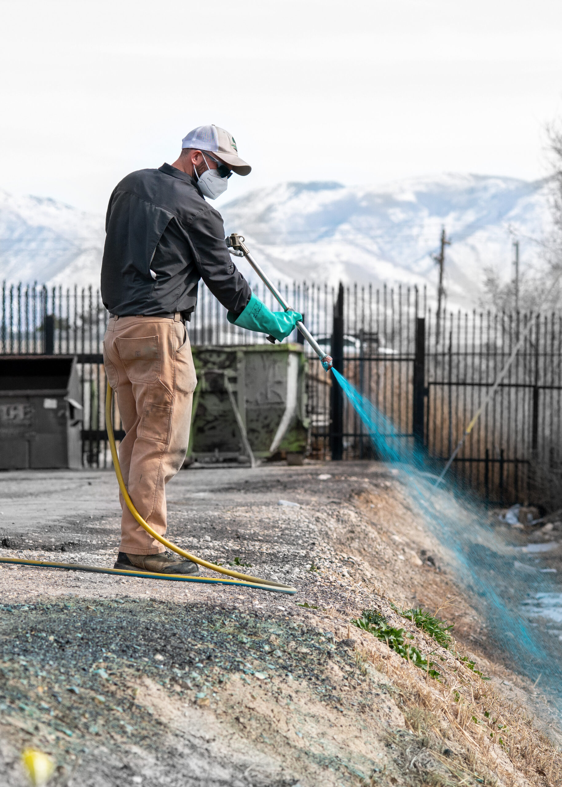 Specialist spraying weed control in a ditch